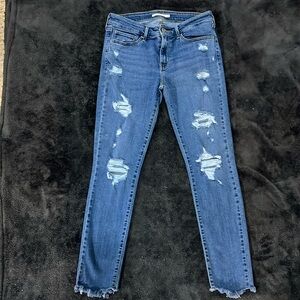 Levi’s 711 Skinny destroyed medium wash jeans 29